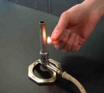 Bunsen Burner Being Safely Lit With a Match