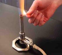 Lighting Bunsen Burner with Match