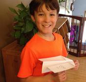 Boy Testing  Paper Airplane